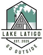 A logo featuring an A-frame cabin, pine trees, and smoke, with text reading "LAKE LATIGO", "EST. 2025", and "GO OUTSIDE".