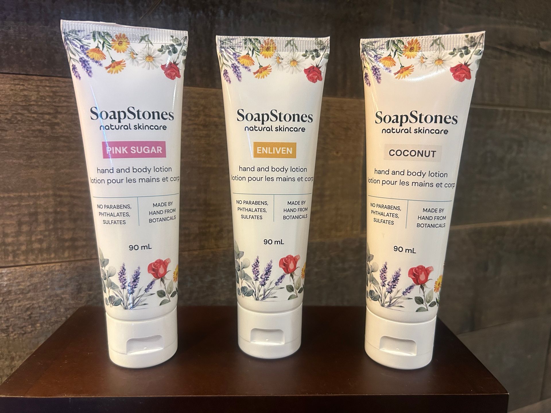 A display of SpaRitual nail polish in various colors on shelves at a beauty salon.