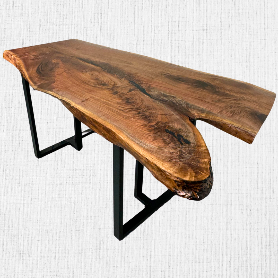 A wooden table with metal legs on a white background.