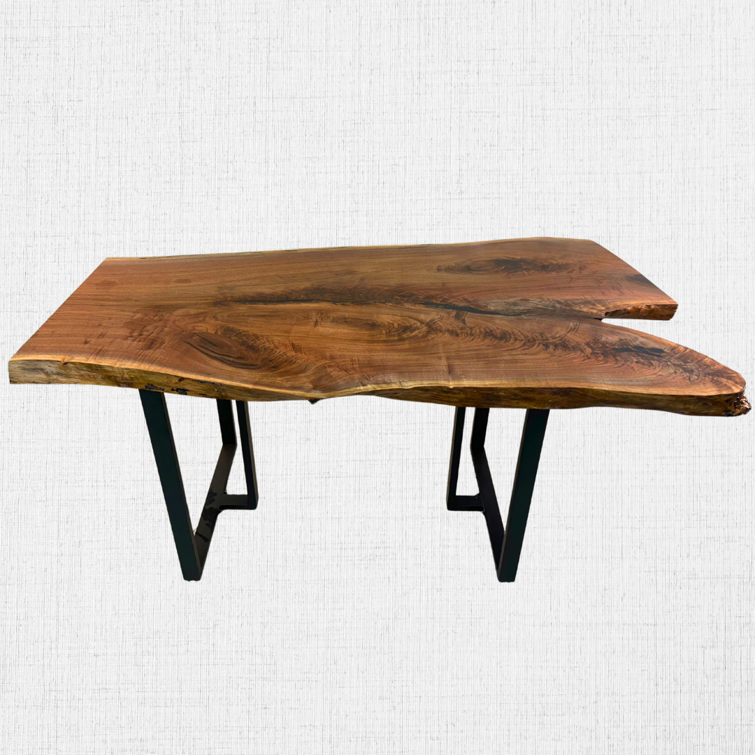 A wooden table with metal legs on a white background.