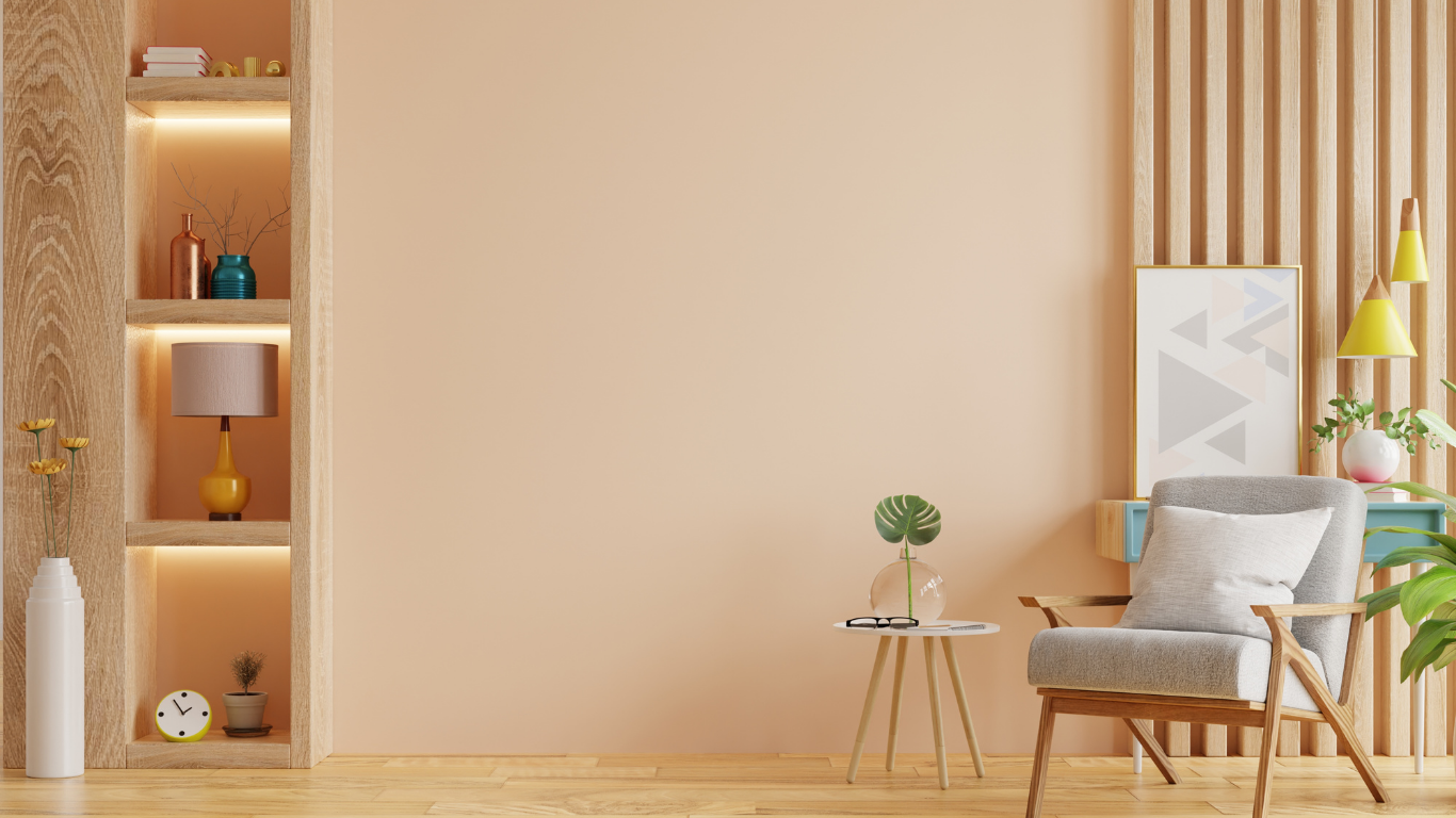 Living room with chair, side table, and wall shelves with decor. Peach walls, wood accents, and a minimalist style.