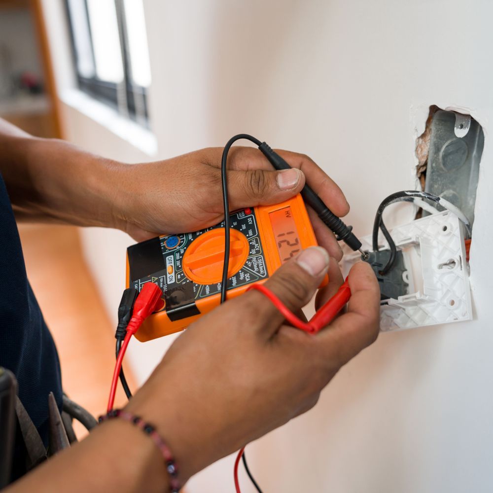 Electrician Fixing an Electrical Outlet — Ballarat VIC — Faulkner Electrical Power