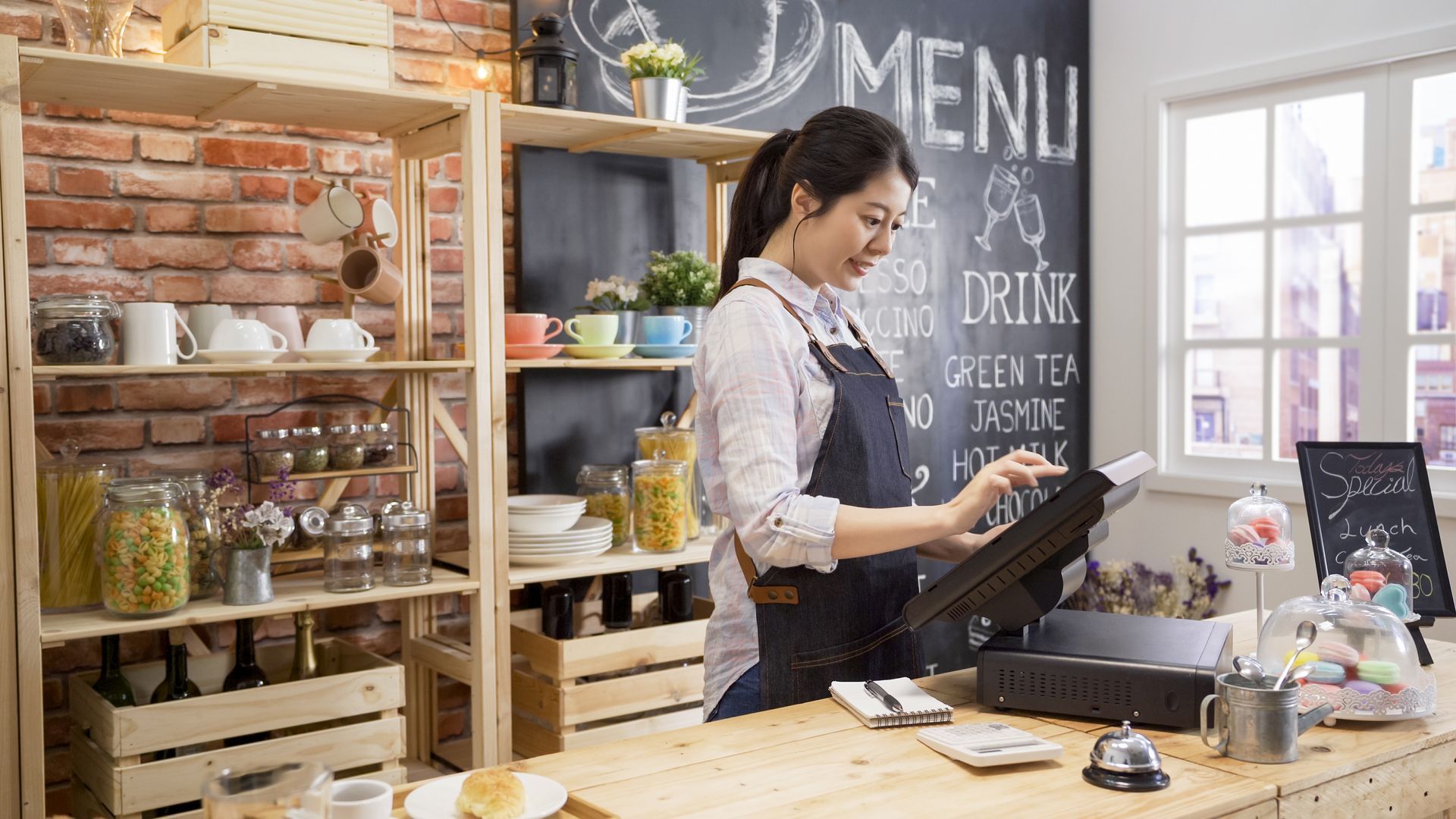Woman managing accounts and organizing receipts for a professional business accounting service.