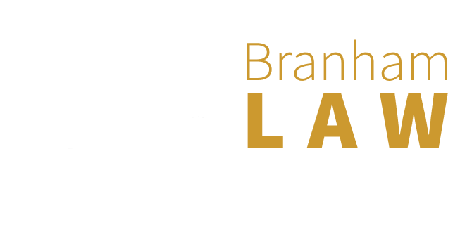 A red and white logo with a scale of justice and a pillar.