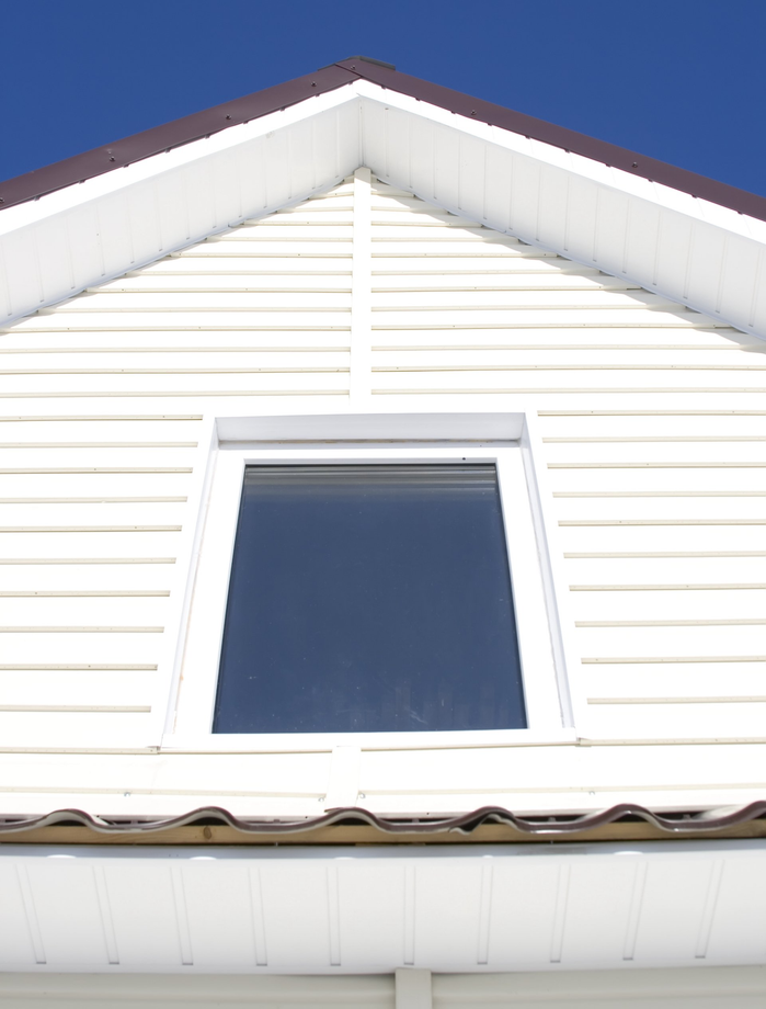 White vinyl siding, soffits and gutters