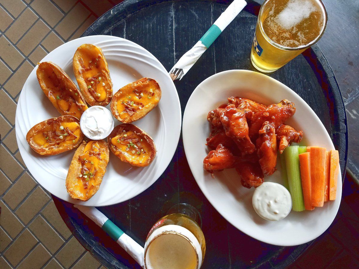 photo of potato skins and wings