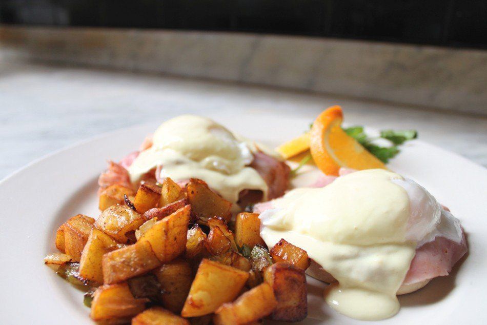 photo of eggs Benedict and home fries