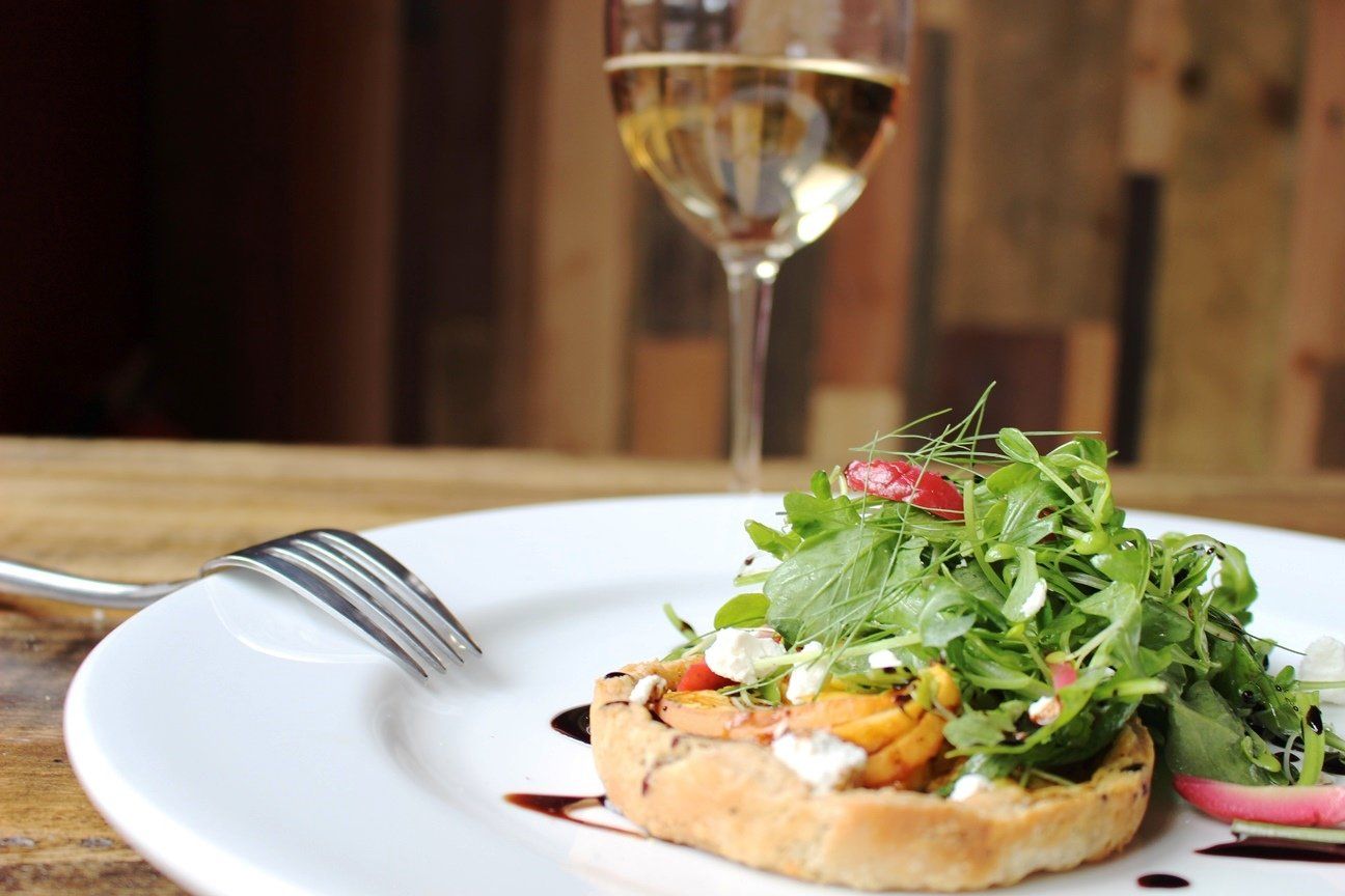 photo of wine and bruschetta