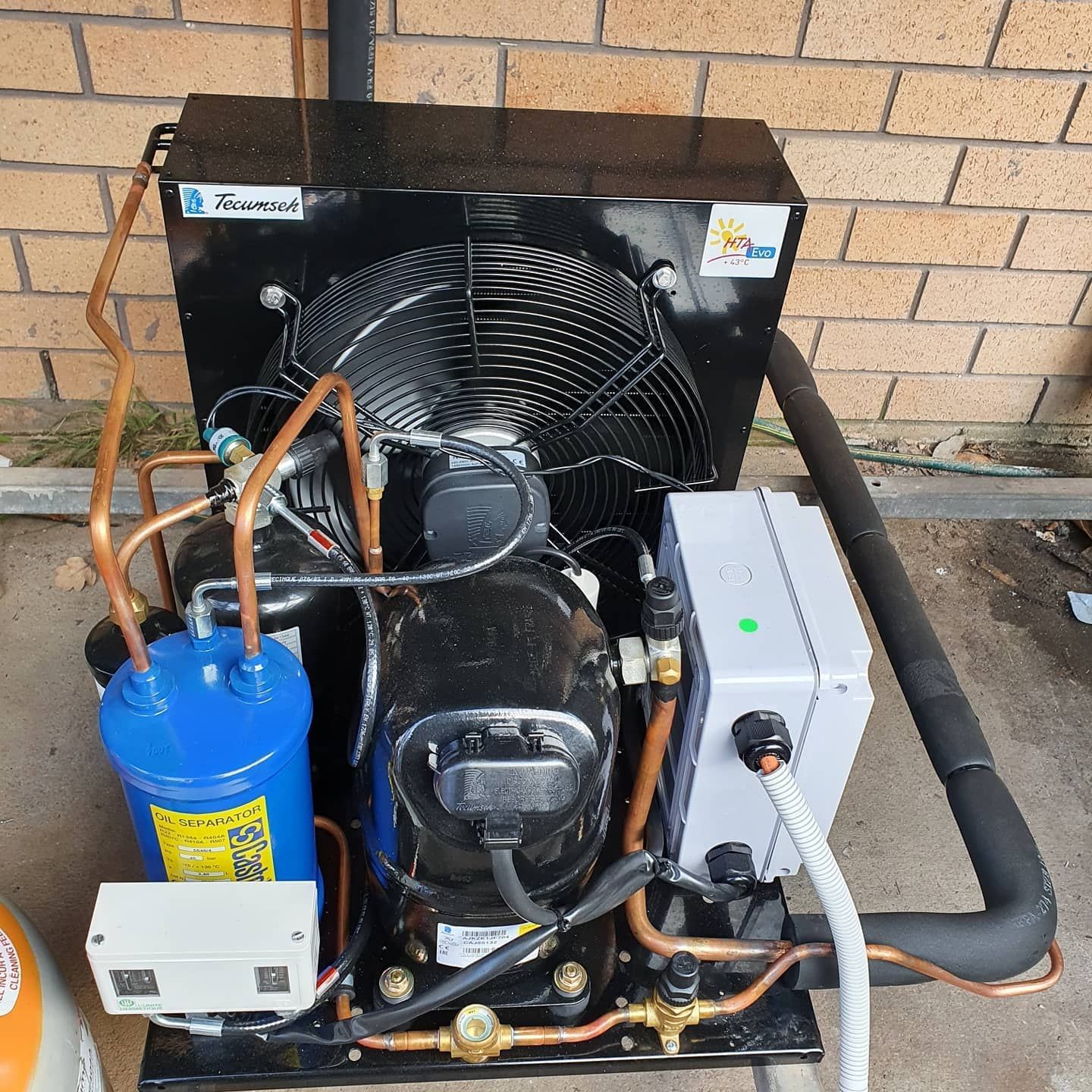 Black Refrigeration Unit — Bay & Basin Air Conditioning & Refrigeration Pty Ltd in St Georges Basin, NSW