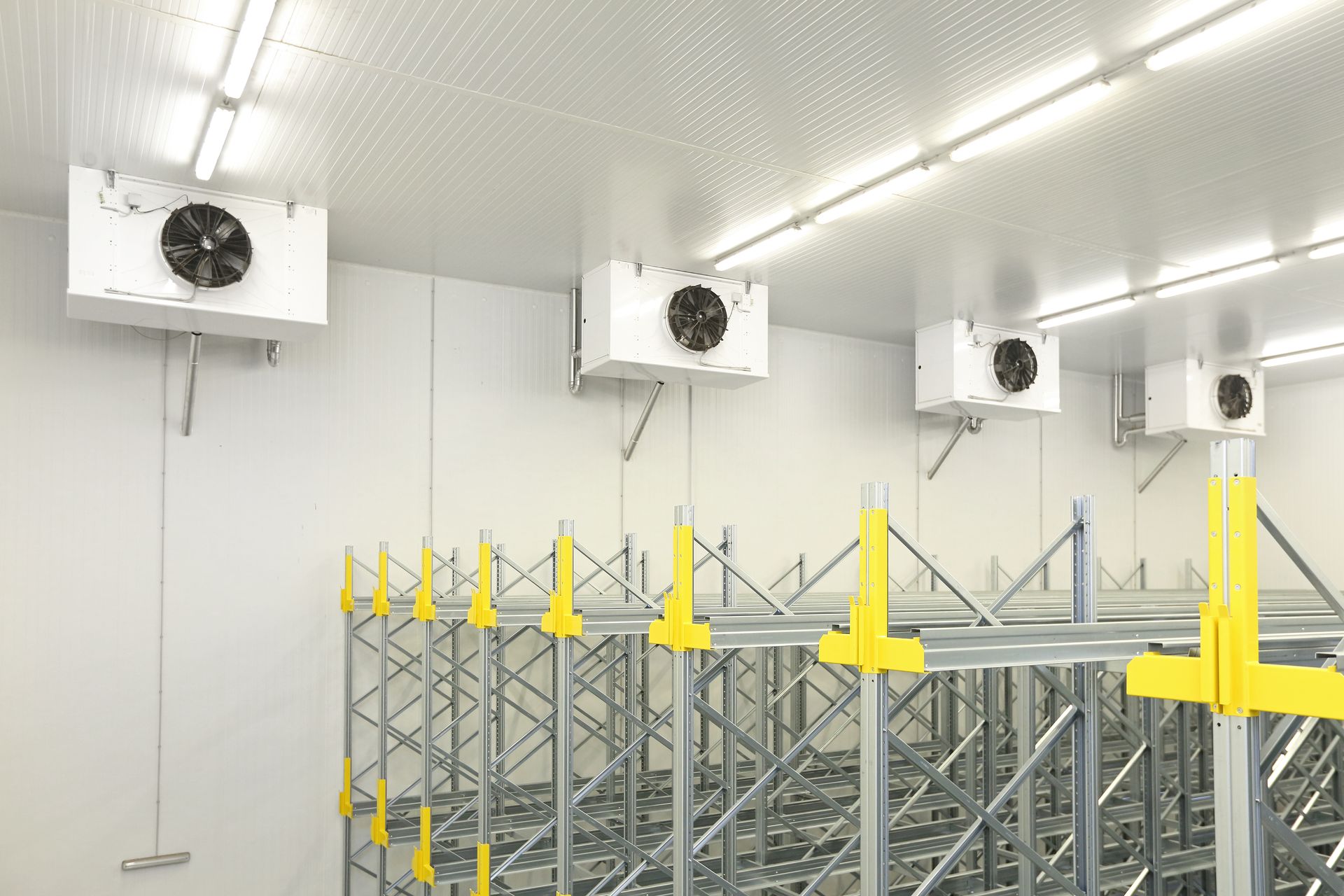 Cold Storage Warehouse Interior With Refrigeration Units — Les Carman Cooling Solutions in El Arish, QLD