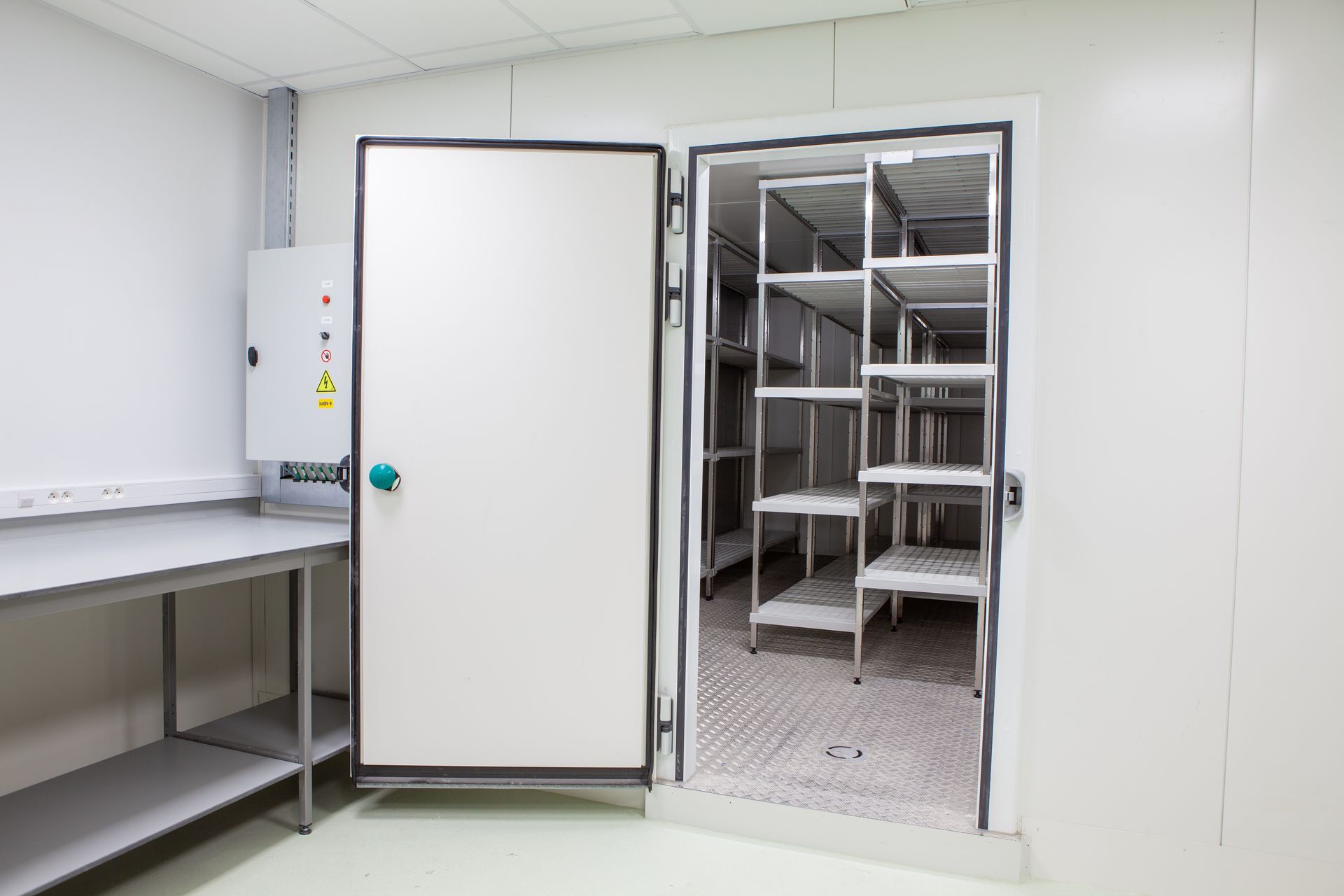 Open Walk-in Freezer With Shelves Inside — Les Carman Cooling Solutions in El Arish, QLD