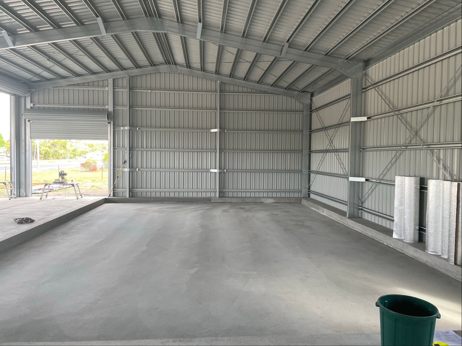 Workshop Interior With a Concrete Floor — Les Carman Cooling Solutions in El Arish, QLD