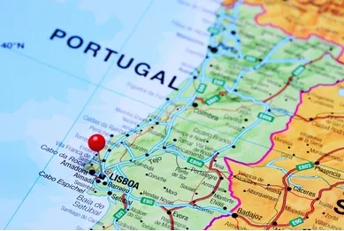 A map of portugal with a red pin pointing to lisboa