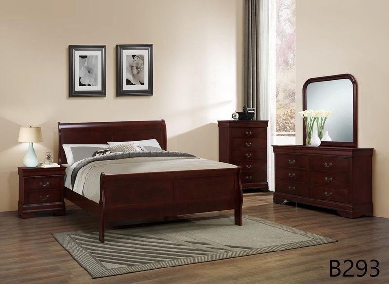 A bedroom with a bed dresser mirror and nightstand