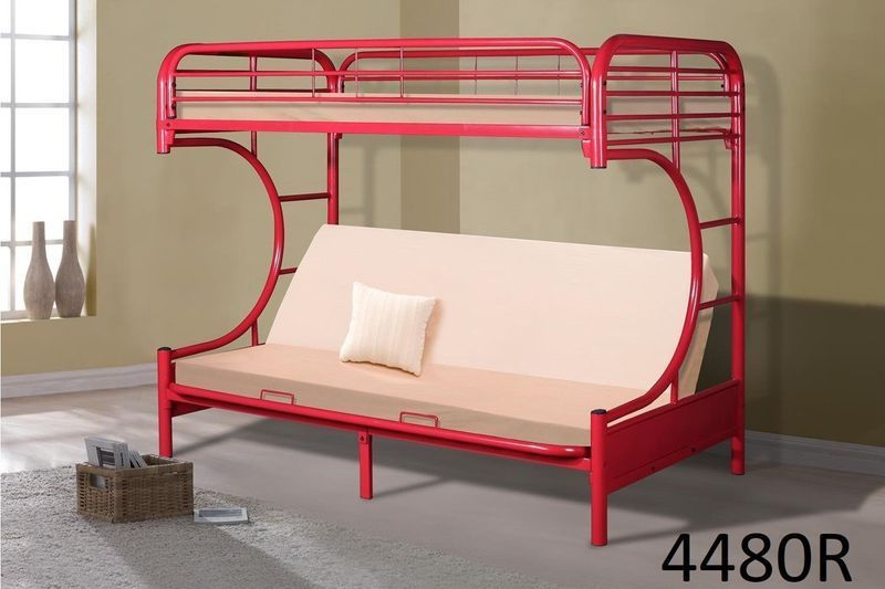 A red bunk bed with a futon underneath it
