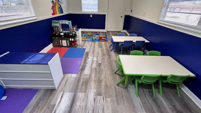 There are tables and chairs in the room.