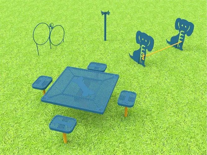 Dog park with blue agility equipment on green grass. Includes hoops, a table with seats, and elephant-shaped obstacles.