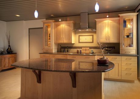 a kitchen with round countertop