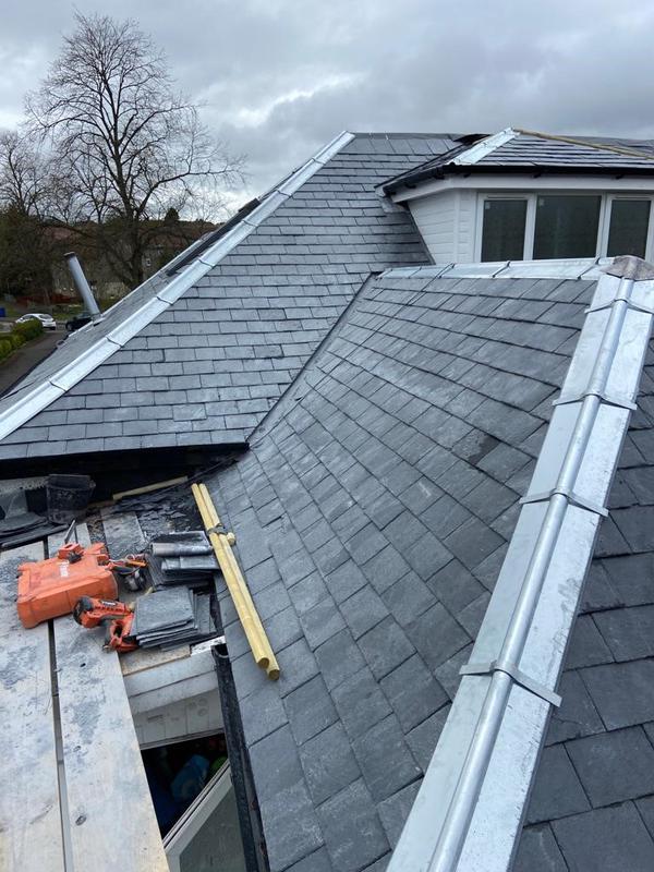 A picture of a grey pitched slate roof in chesterfield