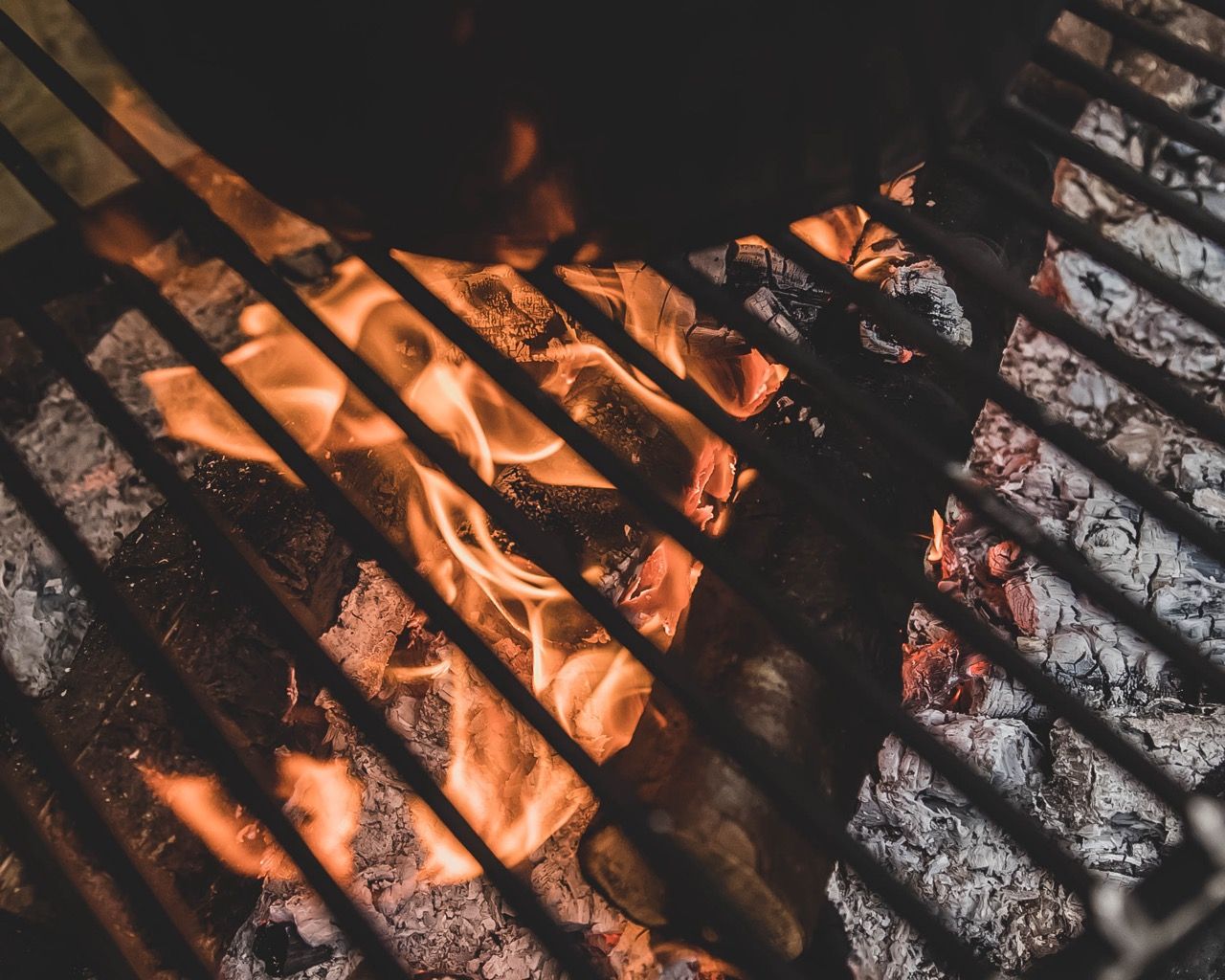 Cast iron pot on a grill.