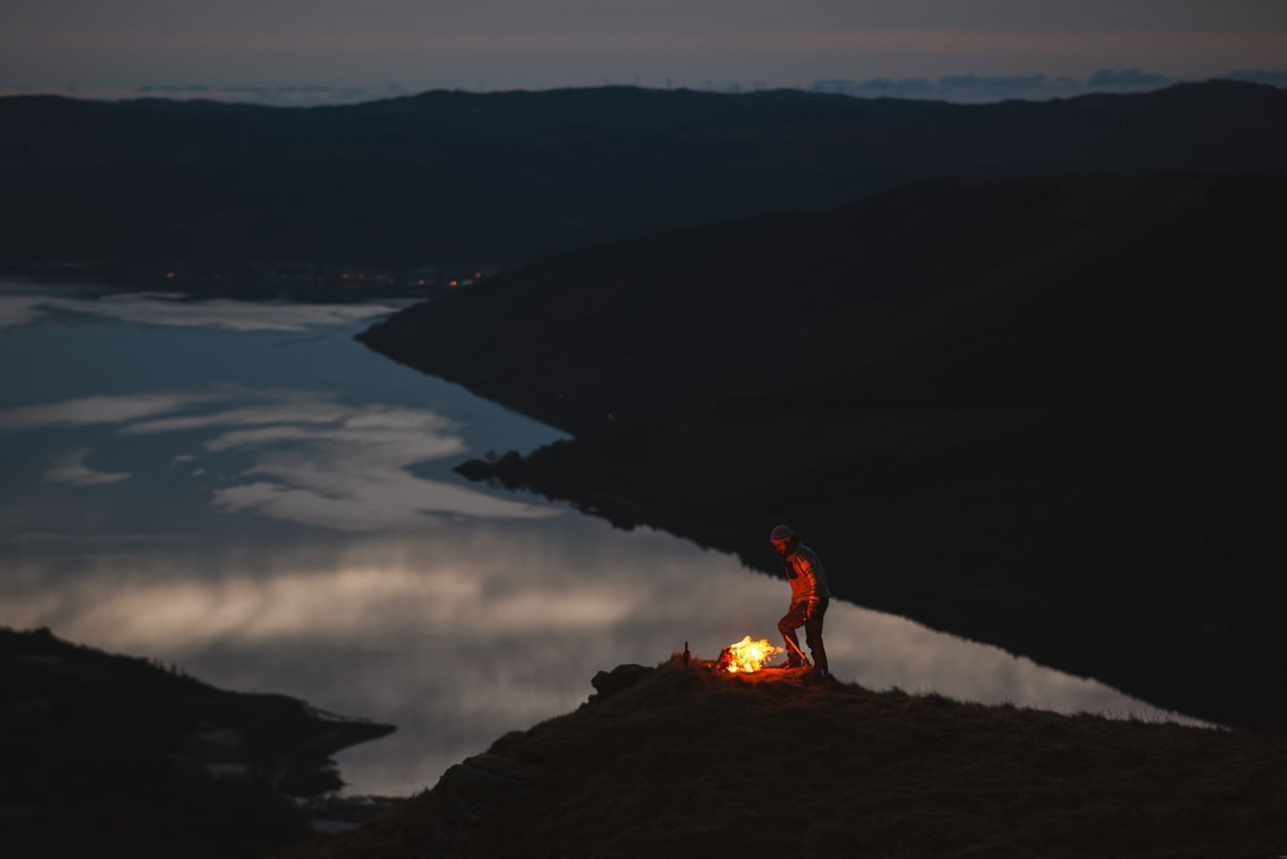 chef on top of a mountain cooking