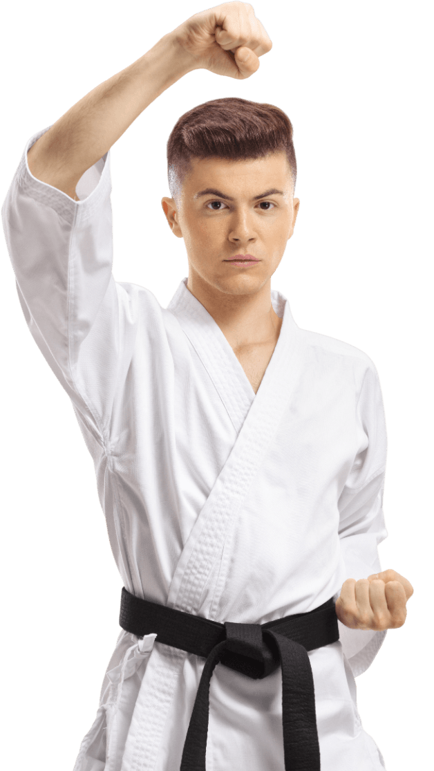 A person wearing a white karate uniform with a black belt, posing with one fist raised and one near their waist.