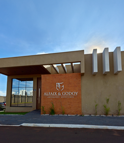 Um prédio com uma placa que diz alfaix & goddy