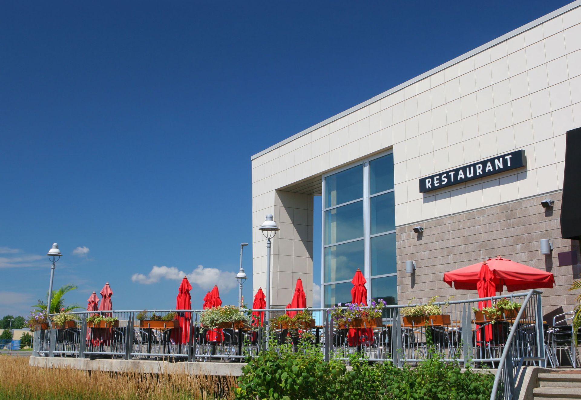 A large white building with the word restaurant on it