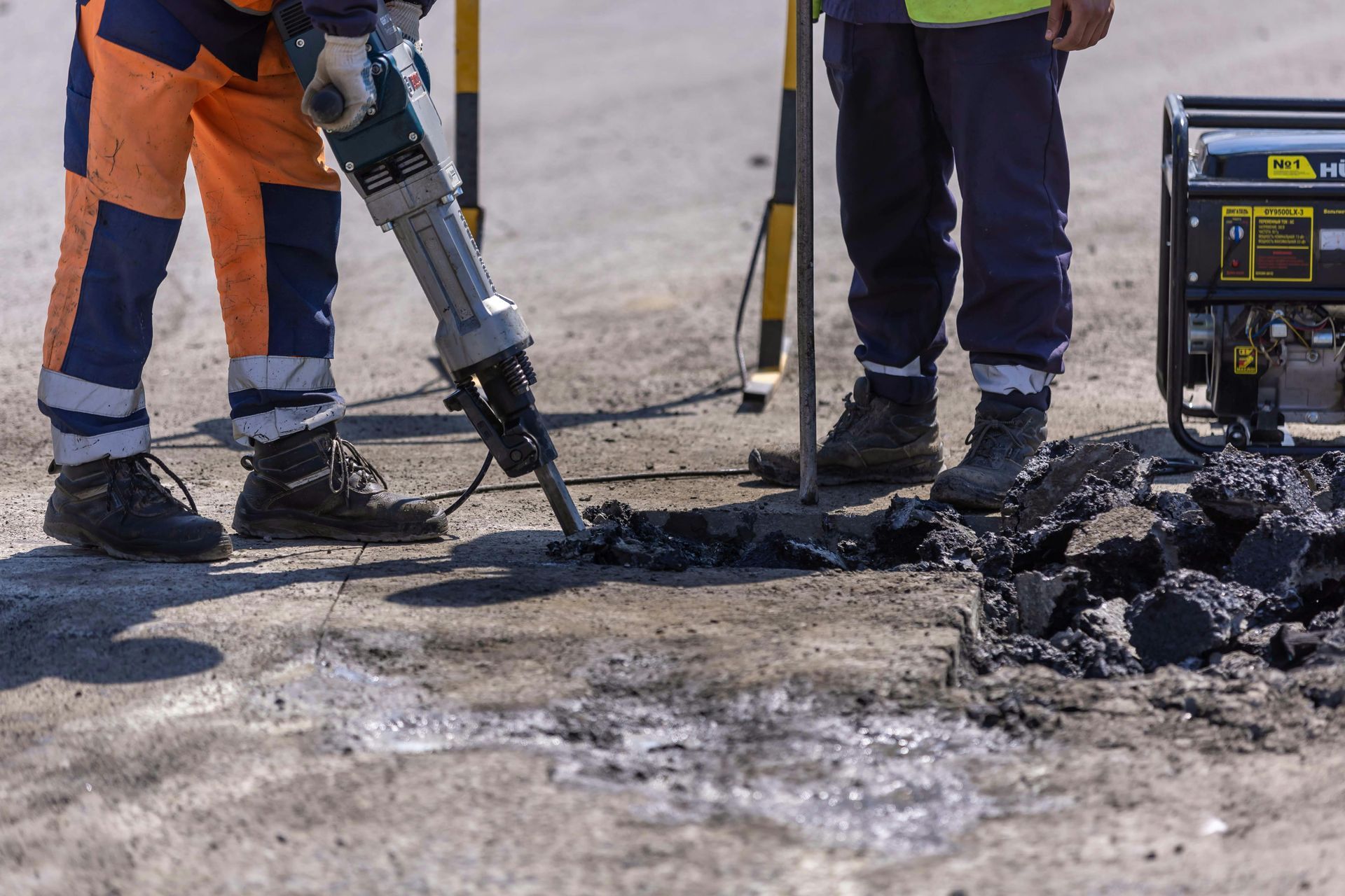 Men grinding a concrete road - Abilene, Texas