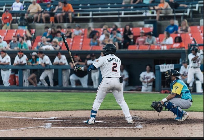 A baseball player with the number 2 on his jersey