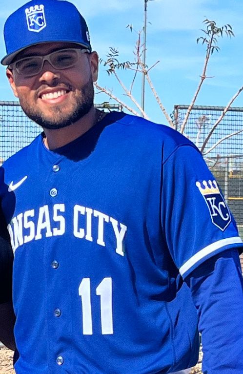 A man wearing a blue kansas city jersey number 11