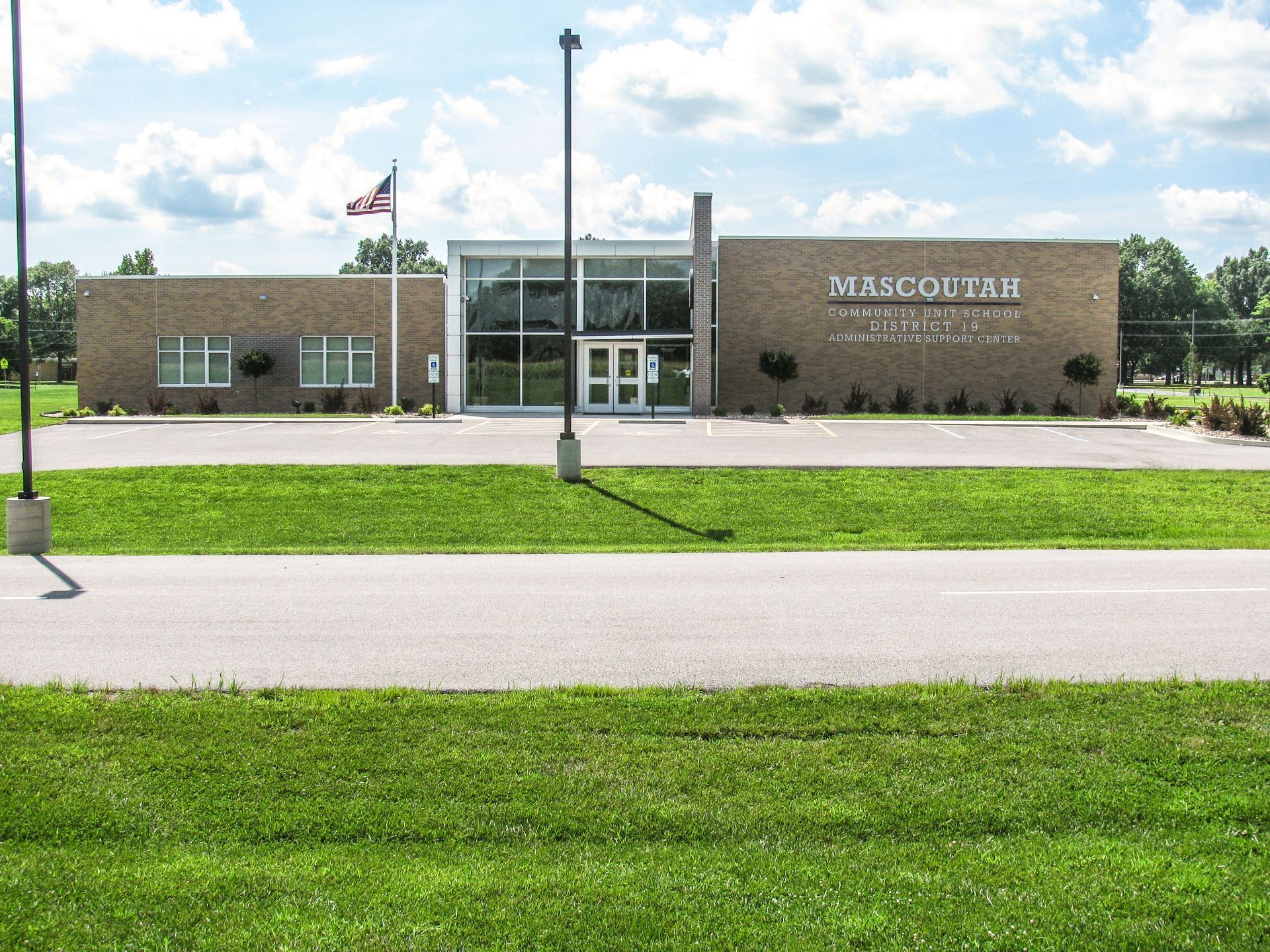 Brick building with glass entrance,