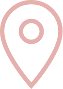 Eine rosa Stecknadel mit einem Kreis in der Mitte auf weißem Hintergrund.