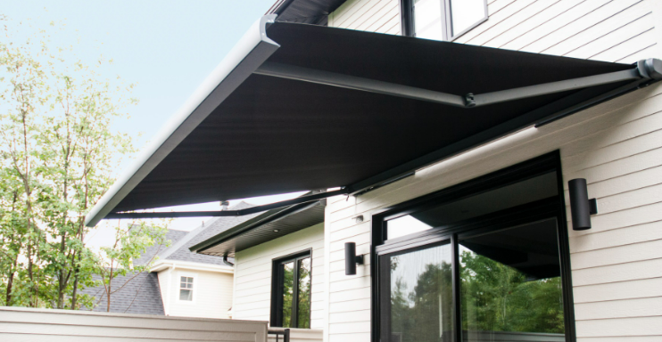 Fully retractable concealed self storing awning