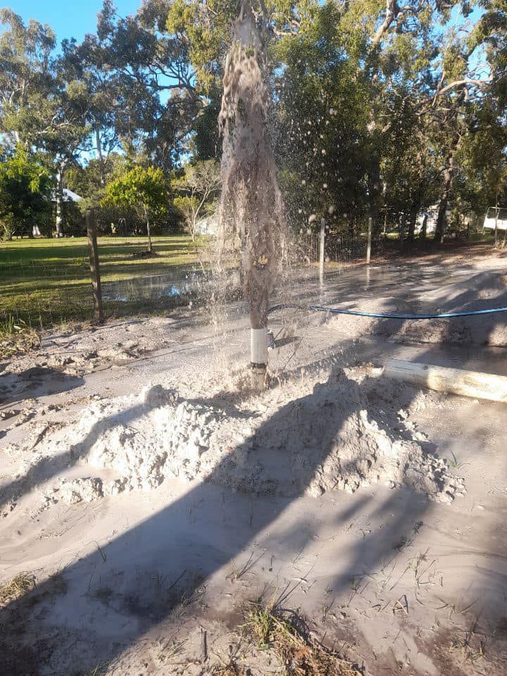 A Fountain is Coming Out of the Ground in a Park — Cheyenne Drilling in Bundaberg, QLD