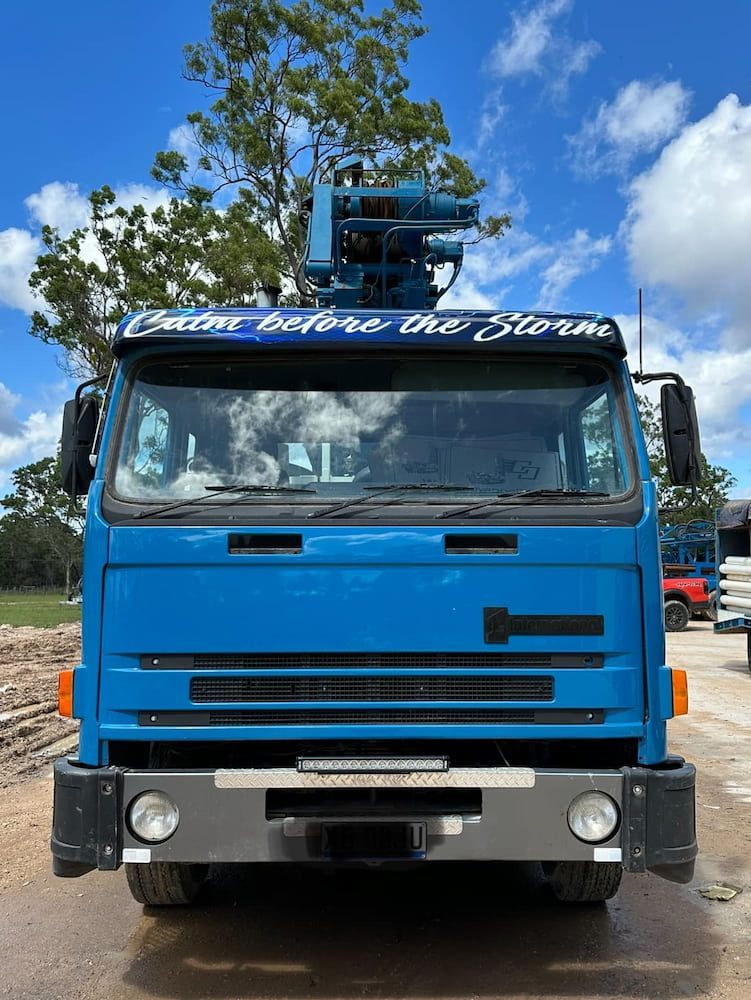 A Blue Truck With a Sticker on the Front — Cheyenne Drilling on the Sunshine Coast, QLD