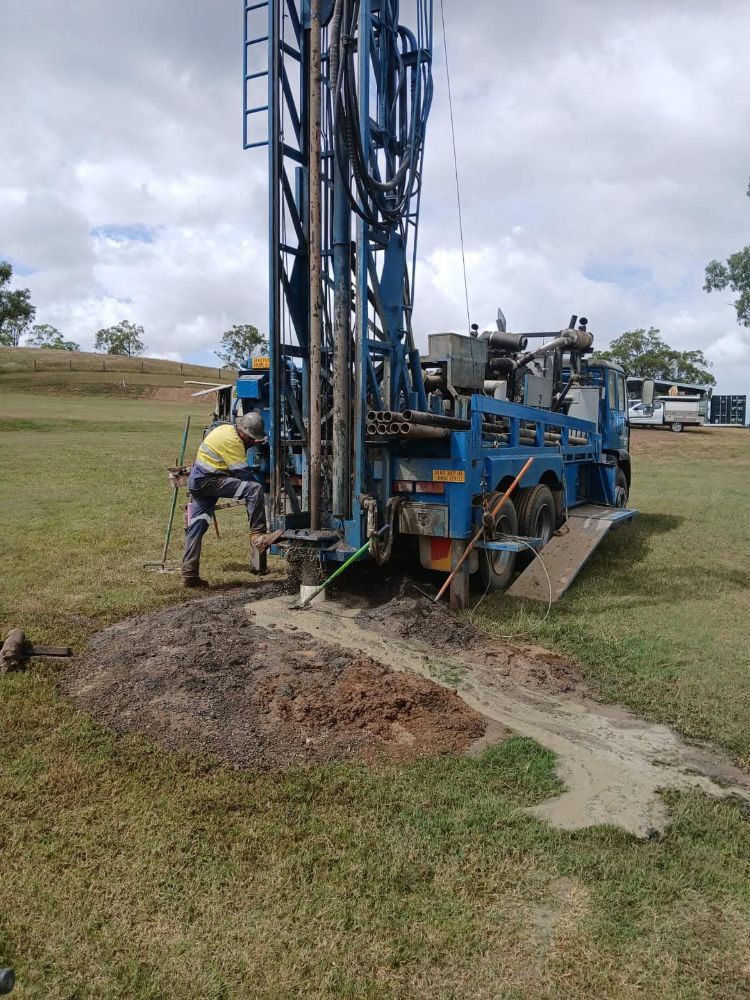 A Man is Working on a Drilling Rig in a Field — Cheyenne Drilling on the Sunshine Coast, QLD