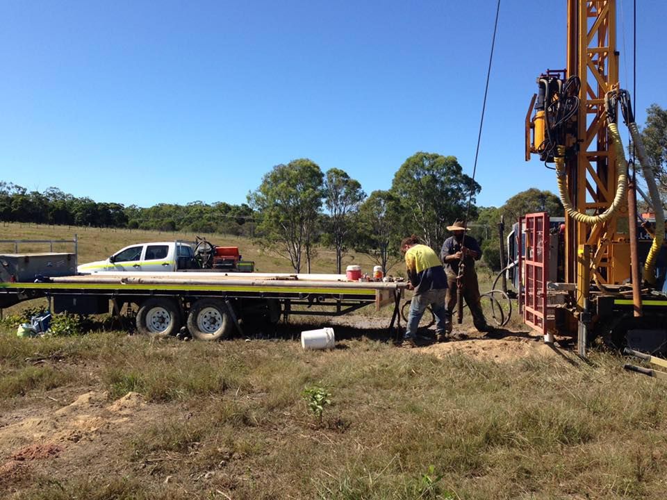 A Group of Men Are Working on a Drilling Rig in a Field — Cheyenne Drilling on the Sunshine Coast, QLD