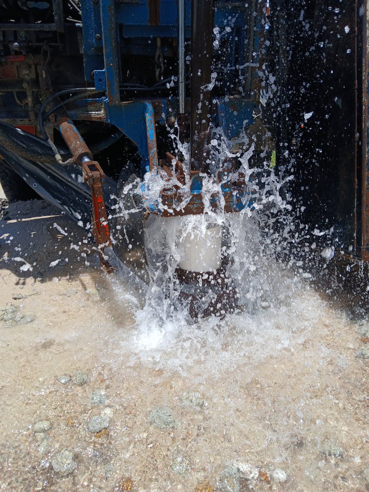 A Man is Standing in Front of a Large Machine — Cheyenne Drilling on the Sunshine Coast, QLD