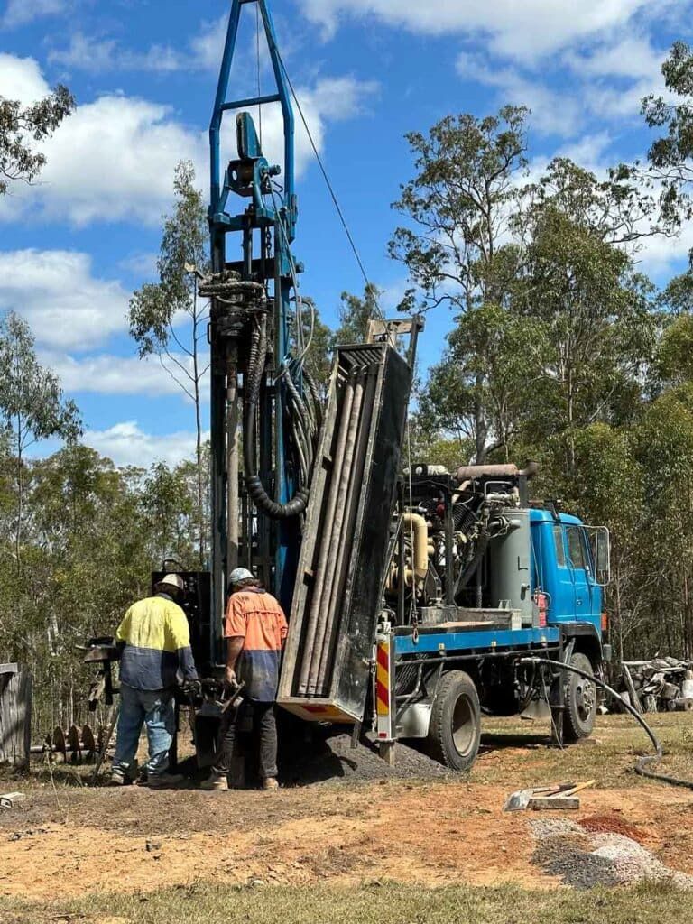 A Group of Men Are Working on a Drilling Rig in a Field — Cheyenne Drilling on the Sunshine Coast, QLD