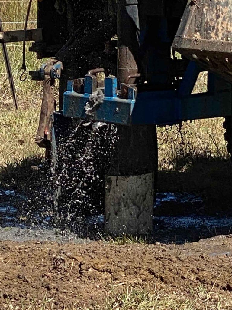 A Tractor is Drilling a Hole in the Ground in a Field — Cheyenne Drilling on the Sunshine Coast, QLD