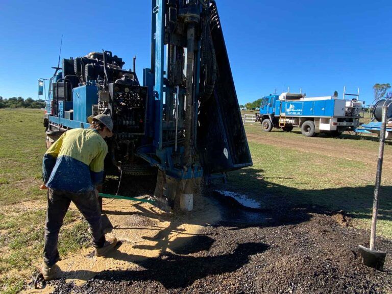 A Man is Working on a Machine in a Field — Cheyenne Drilling on the Sunshine Coast, QLD