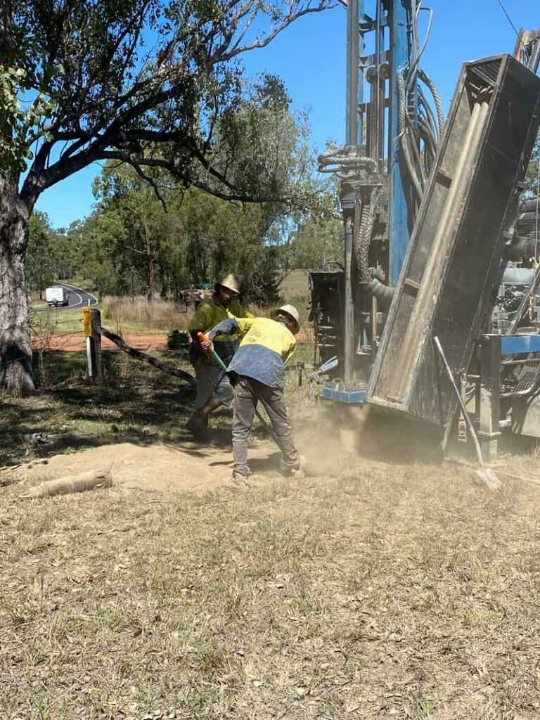 Two Men Are Working on a Drilling Rig in a Field — Cheyenne Drilling on the Sunshine Coast, QLD