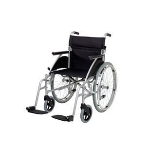 A black and silver wheelchair is sitting on a white surface.