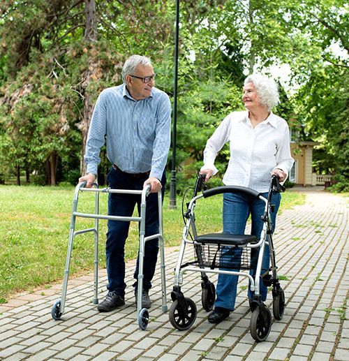 Two Elderly Using Mobility Walkers — Healthcare Equipment in Lake Macquarie