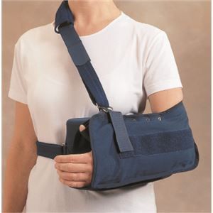 A woman is wearing a blue arm sling