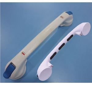 Two white handles are sitting on a blue surface