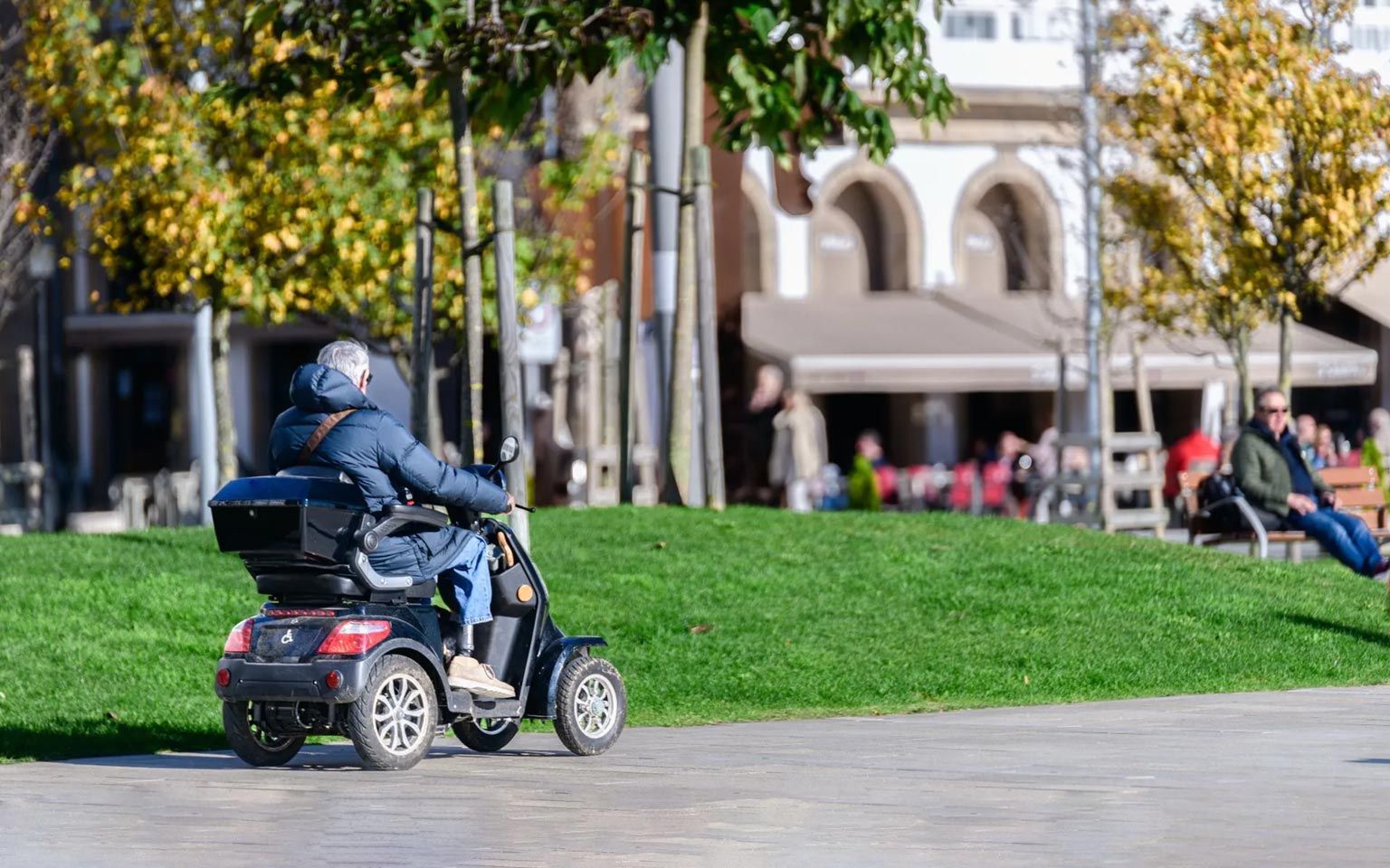 A Man Riding A Mobility Aid On The Central Coast