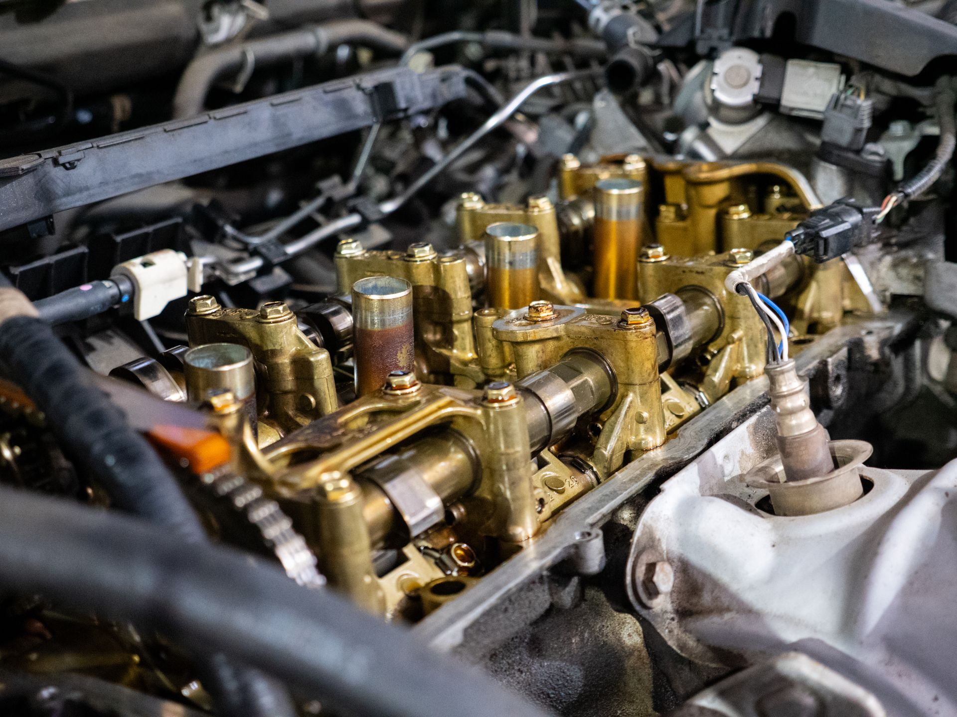 Mid-century modern credenza with a lamp and decorative objects, in a sunlit room.
