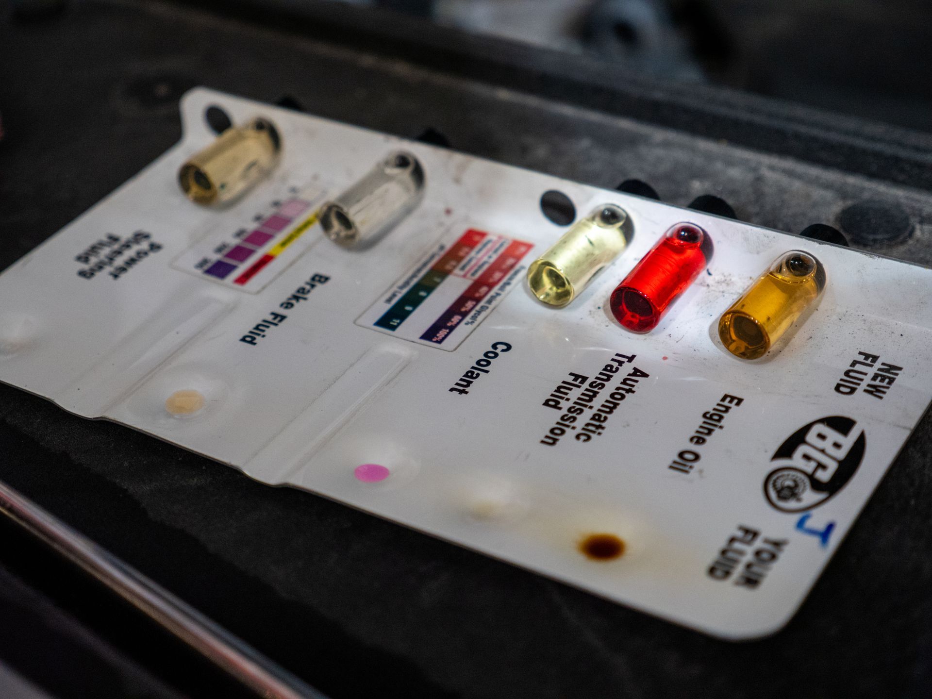 Mid-century modern credenza with a lamp and decorative objects, in a sunlit room.